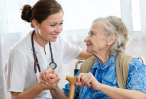 nursing home photo with elderly woman and nurse