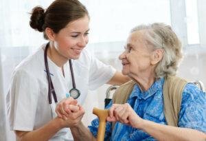 older woman talking with a healthcare advocate